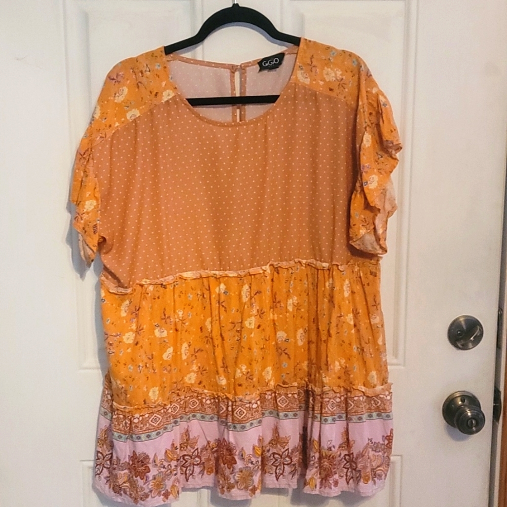 Multi patterned flowy shirt size med